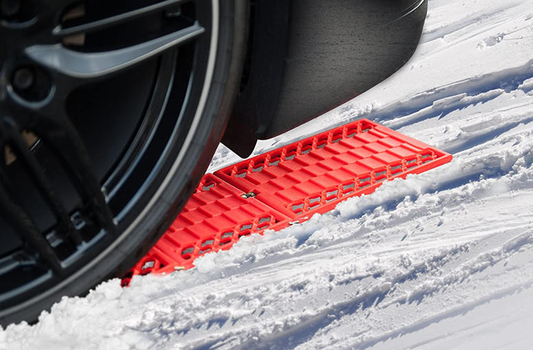 Conquer Winter's Icy Grasp with Portable Snow Tire Traction Mats